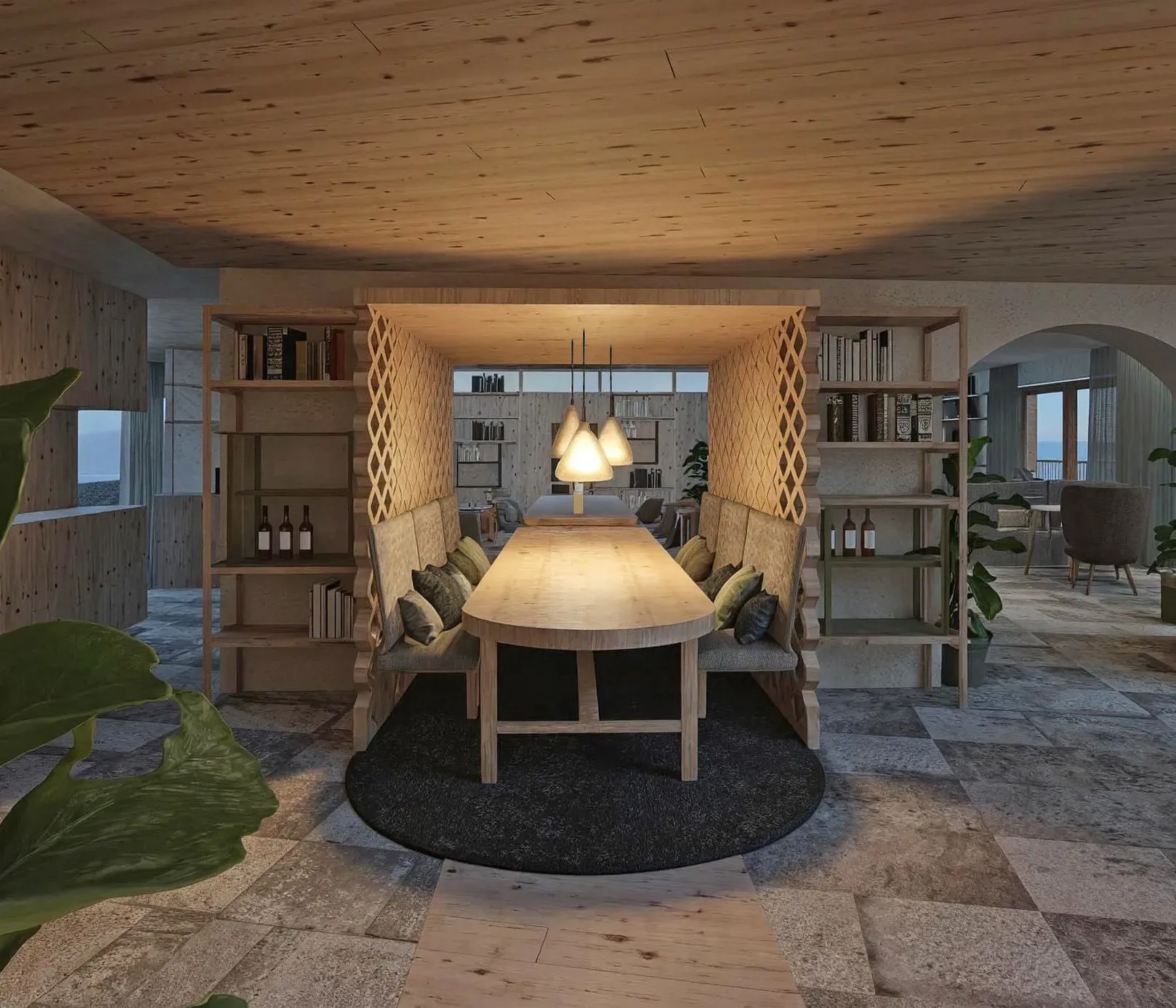 Cozy interior with a wooden dining table surrounded by cushioned benches and warm pendant lights. Bookshelves and leafy plants create a welcoming atmosphere.
