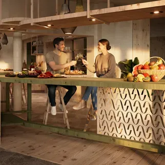 Couples socialize in a warm, inviting kitchen with wood accents. They prepare food, share drinks, and enjoy a cozy, intimate atmosphere filled with conversation.