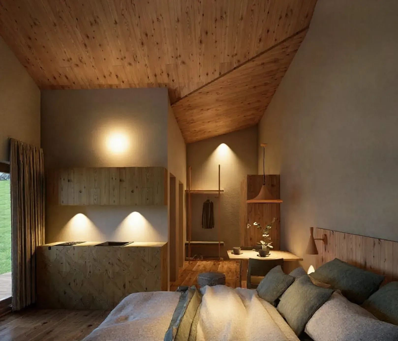 Gemütliches Holzschlafzimmer mit schräger Decke, sanfter Beleuchtung und moderner Einrichtung. Mit einem Bett mit Kissen, einer kleinen Küchenzeile und großen Fenstern mit Blick auf grüne Felder.